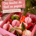 Boules de Noël en papier colorées et décoratives dans un sapin bohème